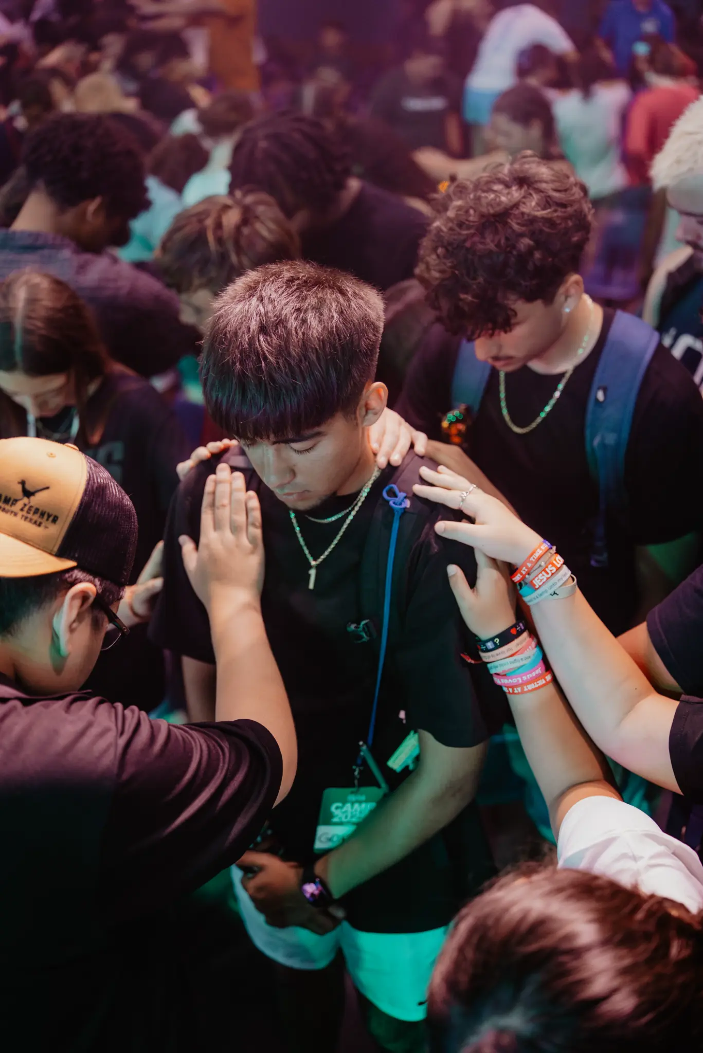 Gen Z students praying together